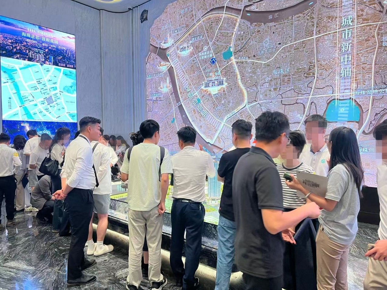 “穗八条”点燃广州楼市 五一黄金周日均认购套数同比涨超5成